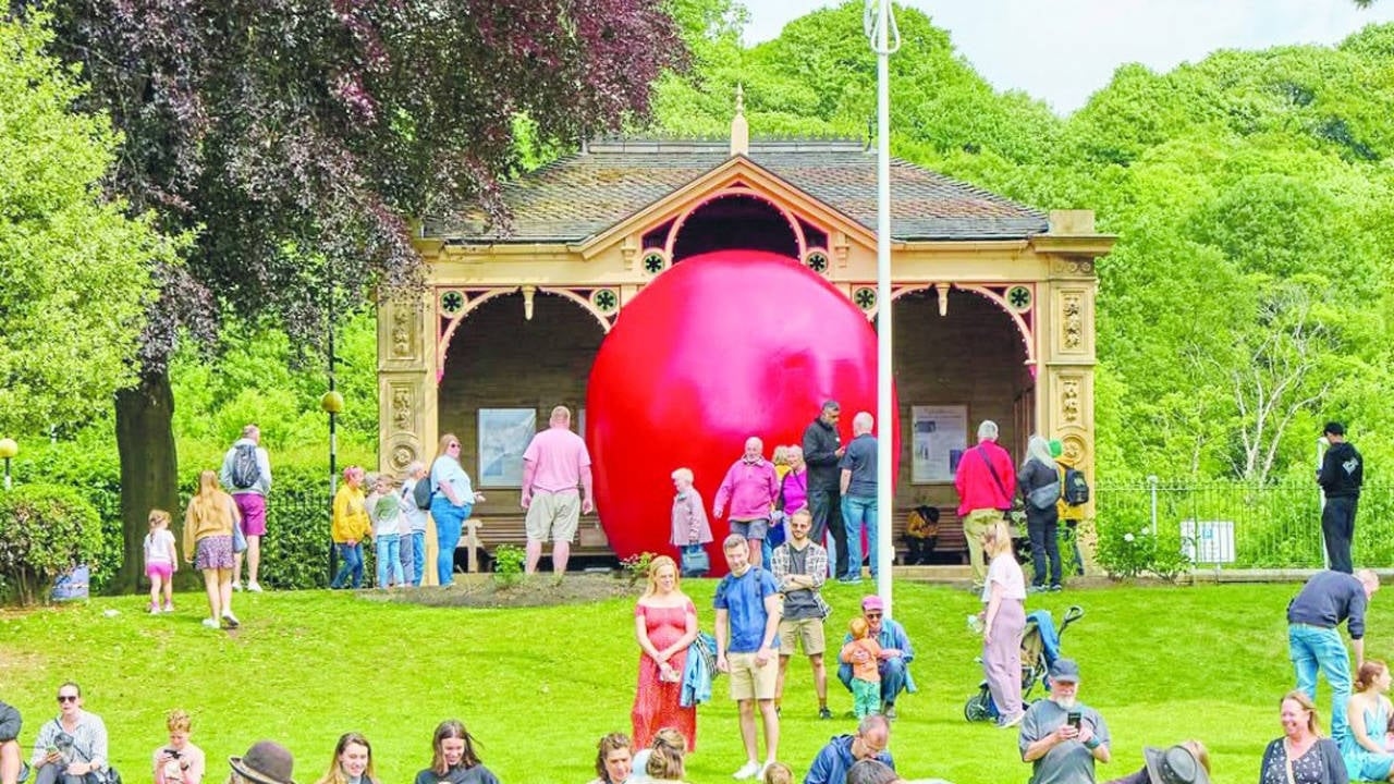 One day a red ball comes to the city